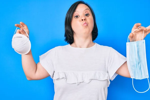 Brunette Woman Syndrome Holding Two Different Safety Masks Looking Camera — Stock Photo, Image