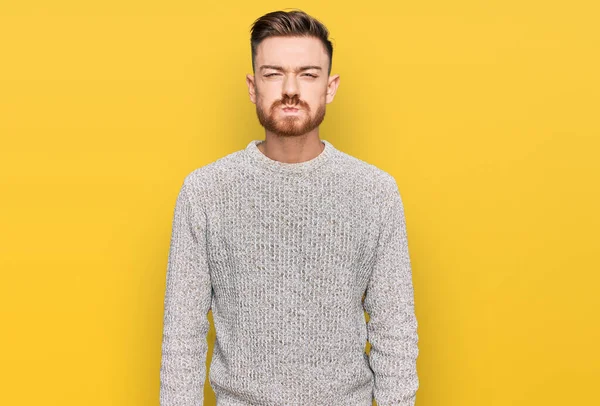Young Redhead Man Wearing Casual Winter Sweater Puffing Cheeks Funny — ストック写真
