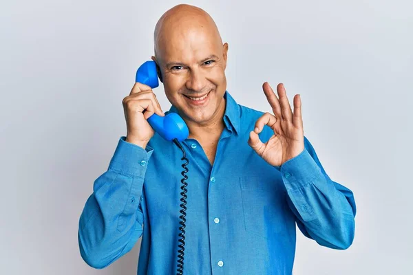 Middle Age Bald Man Speaking Vintage Telephone Doing Sign Fingers — Stock Photo, Image