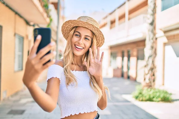 Young Blonde Tourist Girl Smiling Happy Doing Video Call Using — Stock Photo, Image