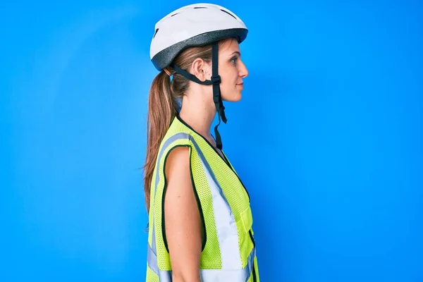 Young Caucasian Girl Wearing Bike Helmet Reflective Vest Looking Side — Zdjęcie stockowe
