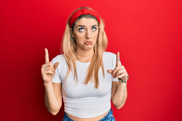 Young Caucasian Woman Wearing Casual White Shirt Pointing Looking Sad — Foto Stock