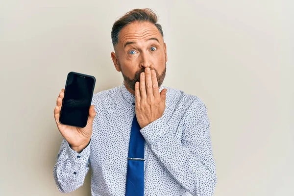 Handsome Middle Age Business Man Holding Smartphone Showing Blank Screen — Stok fotoğraf