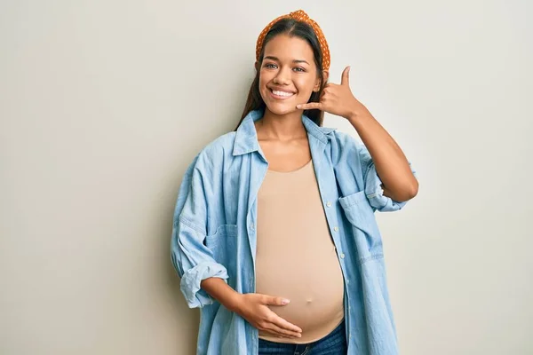 Beautiful Hispanic Woman Expecting Baby Touching Pregnant Belly Smiling Doing — Stockfoto
