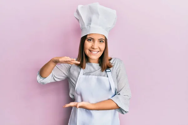 Young Beautiful Woman Wearing Professional Cook Uniform Hat Gesturing Hands — 图库照片