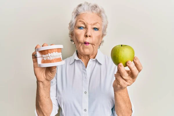 Senior Grey Haired Woman Holding Green Apple Denture Teeth Making — 图库照片