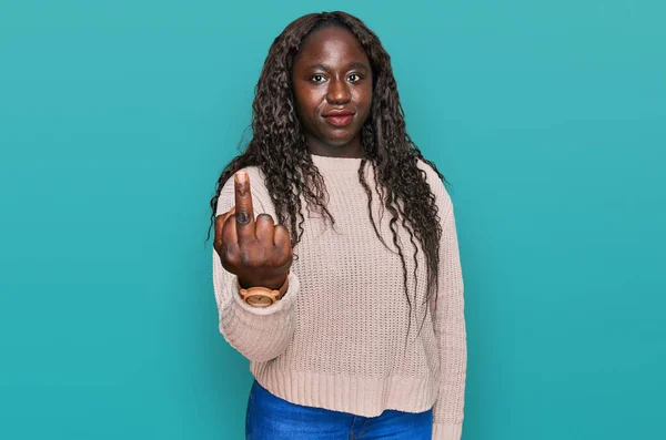 Young African Woman Wearing Wool Winter Sweater Showing Middle Finger — Stock Fotó