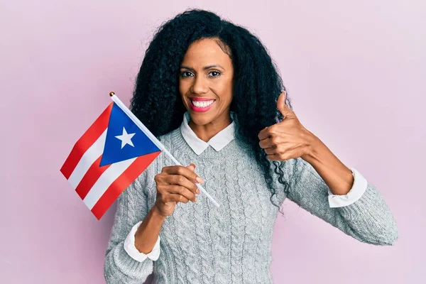 Middle Age African American Woman Holding Puerto Rico Flag Smiling — Zdjęcie stockowe