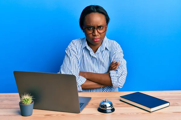 Young African Woman Working Hotel Reception Using Laptop Skeptic Nervous — Stok fotoğraf