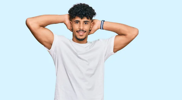 Young Arab Man Wearing Casual White Shirt Relaxing Stretching Arms — Stock Fotó