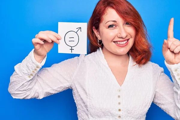 Young Redhead Woman Asking Sex Discrimination Holding Paper Gender Equality — 스톡 사진