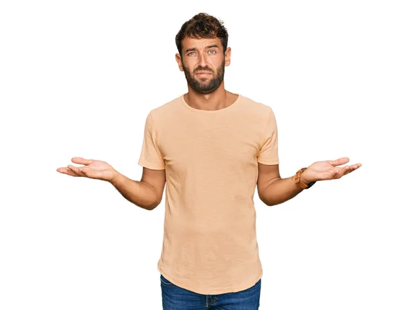 Handsome Young Man Beard Wearing Casual Tshirt Clueless Confused Open — Φωτογραφία Αρχείου