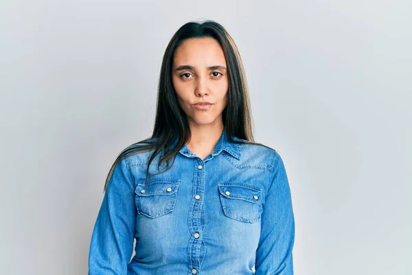 Young Hispanic Woman Wearing Casual Denim Jacket Skeptic Nervous Frowning — Stockfoto