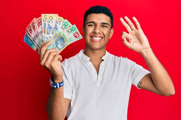 Hombre Árabe Joven Sosteniendo Dólares Australianos Haciendo Signo Con Los —  Fotos de Stock