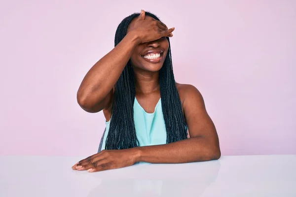 African American Woman Braids Wearing Casual Clothes Sitting Table Smiling — Stock Photo, Image