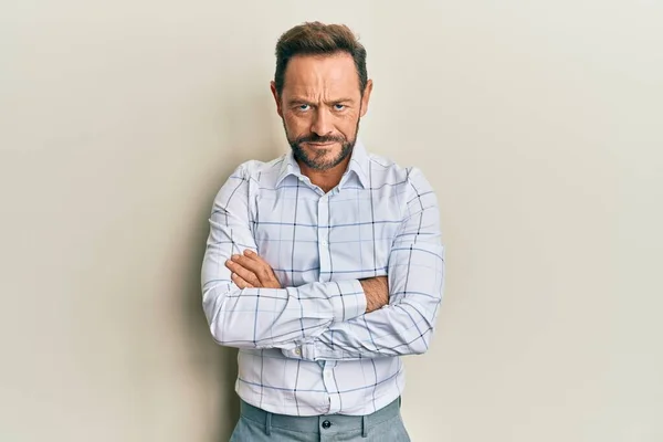 stock image Middle age man wearing business clothes skeptic and nervous, disapproving expression on face with crossed arms. negative person. 