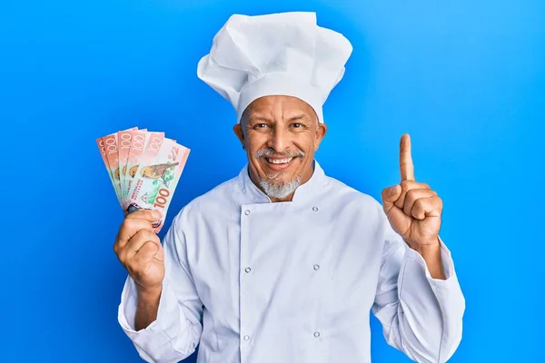 Middle Age Grey Haired Man Wearing Professional Cook Uniform Holding — Stock Photo, Image