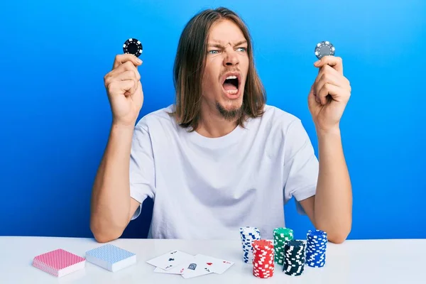 Handsome Caucasian Man Long Hair Playing Poker Holding Casino Chips — Stock Photo, Image