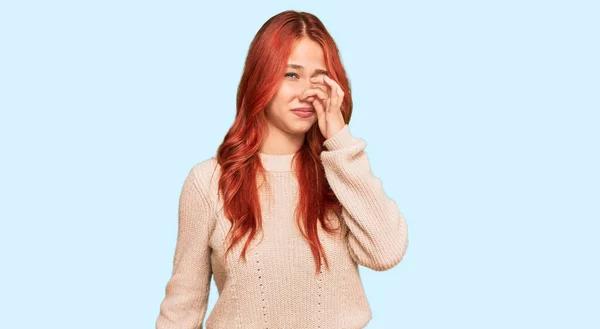 Young Redhead Woman Wearing Casual Winter Sweater Smelling Something Stinky — Stock Photo, Image