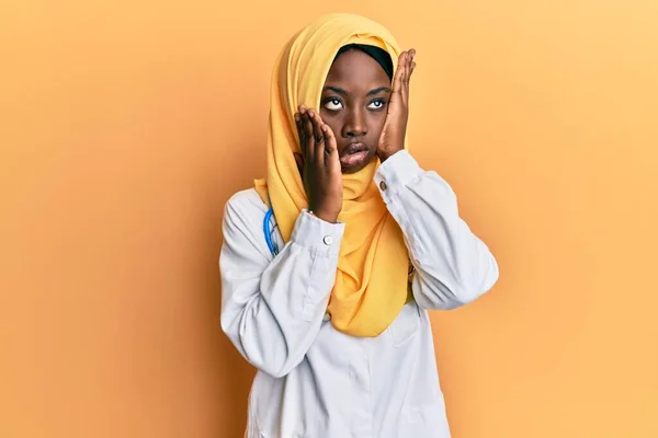 Beautiful African Young Woman Wearing Doctor Uniform Hijab Tired Hands — Stock Photo, Image