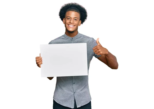 African American Man Afro Hair Holding Blank Empty Banner Smiling — Stock Photo, Image