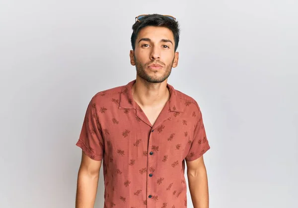 Young Handsome Man Wearing Casual Summer Clothes Looking Camera Blowing — Stock Photo, Image