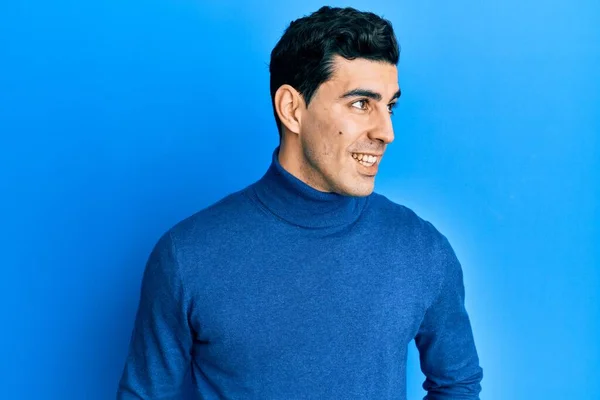 Handsome Hispanic Man Wearing Turtleneck Sweater Looking Side Relax Profile — Stock Photo, Image