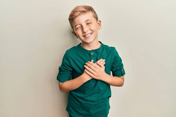 Little Caucasian Boy Kid Wearing Casual Clothes Smiling Hands Chest — Stock Photo, Image