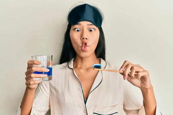 Young Chinese Woman Wearing Pajama Using Toothbrush Mouthwash Making Fish — 스톡 사진