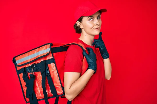 Young Hispanic Woman Holding Take Away Backpack Serious Face Thinking — Stock Photo, Image
