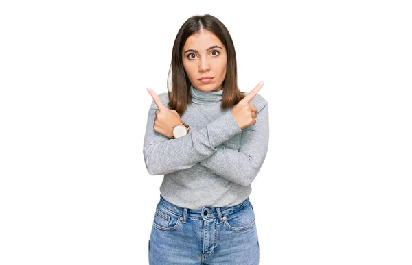 Young Beautiful Woman Wearing Casual Turtleneck Sweater Pointing Both Sides — Stock Fotó