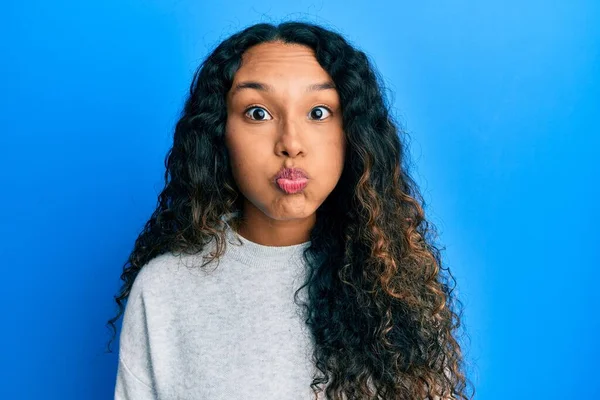 Young Latin Woman Wearing Casual Clothes Puffing Cheeks Funny Face — Stock Photo, Image