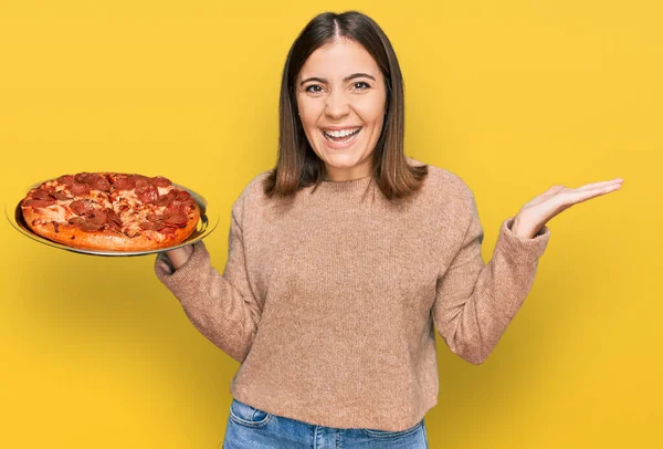 Young Beautiful Woman Holding Italian Pizza Celebrating Victory Happy Smile — Fotografia de Stock