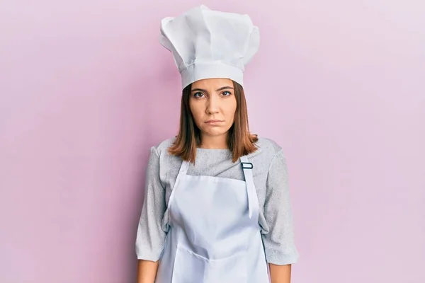 Young Beautiful Woman Wearing Professional Cook Uniform Hat Skeptic Nervous — Foto de Stock