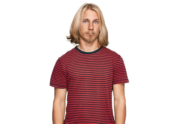 Caucasian Man Blond Long Hair Wearing Casual Striped Shirt Depressed — Stockfoto