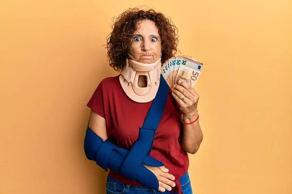 Beautiful Middle Age Mature Woman Wearing Cervical Collar Sling Holding — Stock Photo, Image
