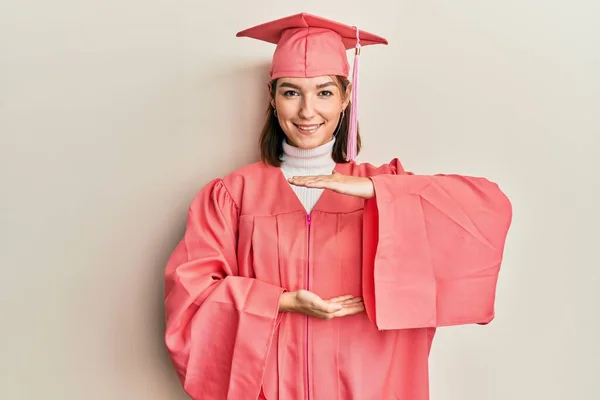Young Caucasian Woman Wearing Graduation Cap Ceremony Robe Gesturing Hands — Stock Photo, Image