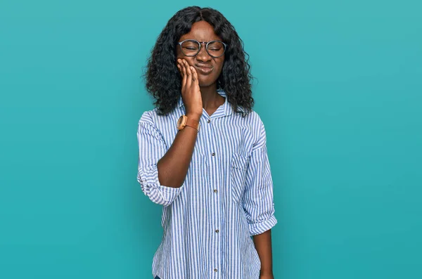 Beautiful African Young Woman Wearing Casual Clothes Glasses Touching Mouth — Stock Fotó