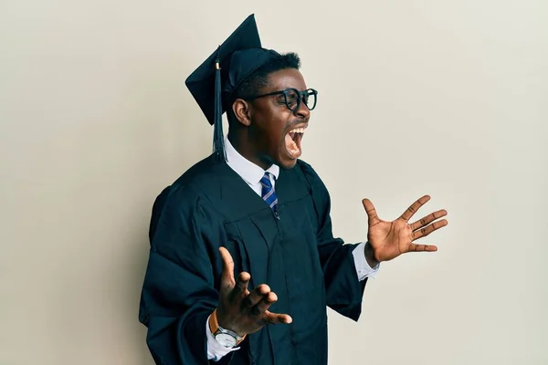 Handsome Black Man Wearing Graduation Cap Ceremony Robe Celebrating Mad — Stock Photo, Image