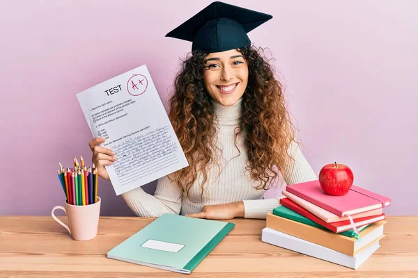 Young Hispanic Girl Wearing Graduated Hat Holding Passed Test Looking — Stockfoto