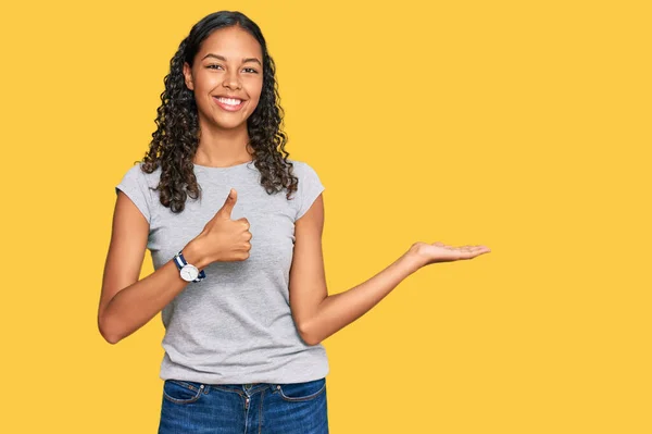 Young African American Girl Wearing Casual Clothes Showing Palm Hand — Stock Photo, Image