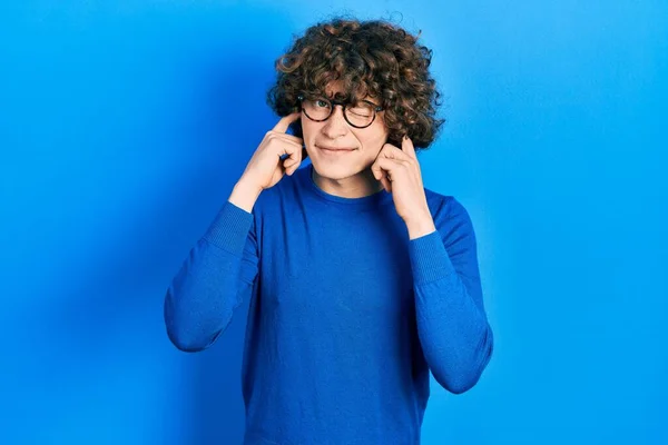 Handsome Young Man Wearing Casual Clothes Glasses Covering Ears Fingers — 스톡 사진