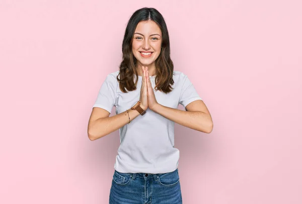 Young Beautiful Woman Wearing Casual White Shirt Praying Hands Together — 스톡 사진