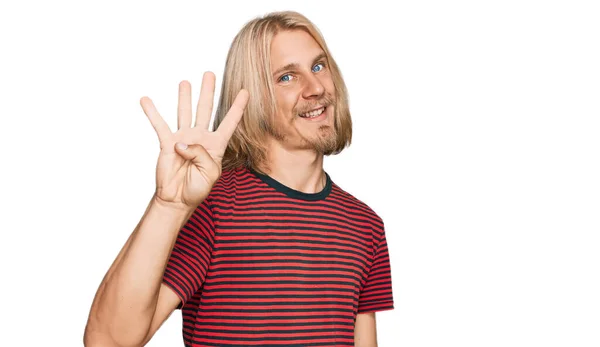Caucasian Man Blond Long Hair Wearing Casual Striped Shirt Showing — Zdjęcie stockowe