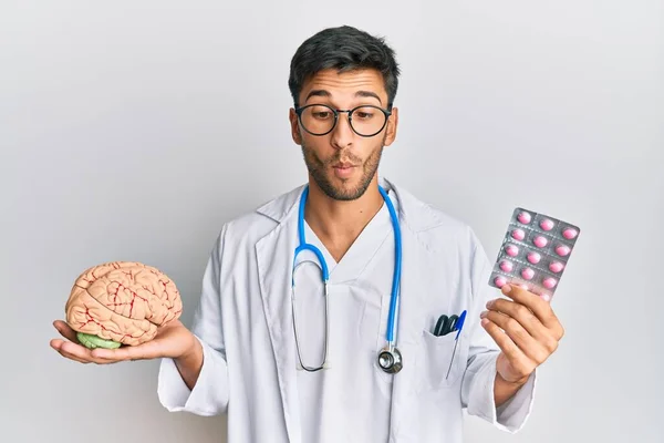 Young Handsome Man Holding Brain Pills Mental Health Concept Making — Fotografia de Stock