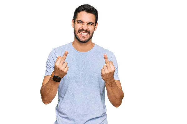Young Hispanic Man Wearing Casual Clothes Showing Middle Finger Doing — Stock fotografie