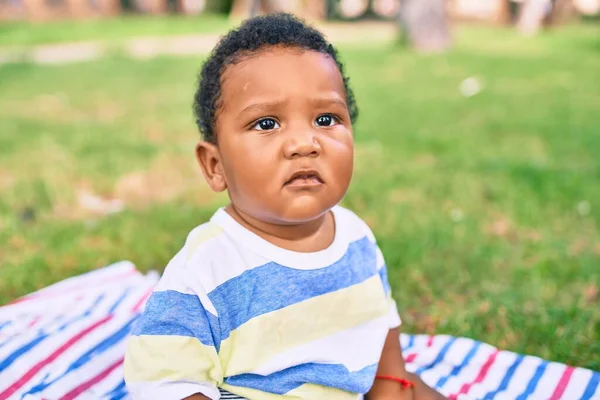 Adorable African American Chubby Toddler Sitting Grass Park — Stock Photo, Image