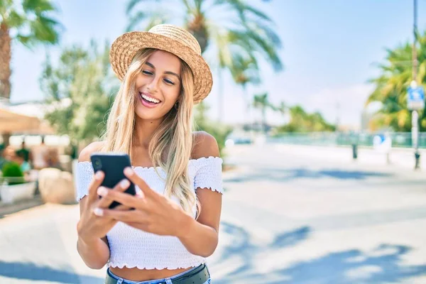 Young Blonde Tourist Girl Smiling Happy Using Smartphone City — Stock Photo, Image