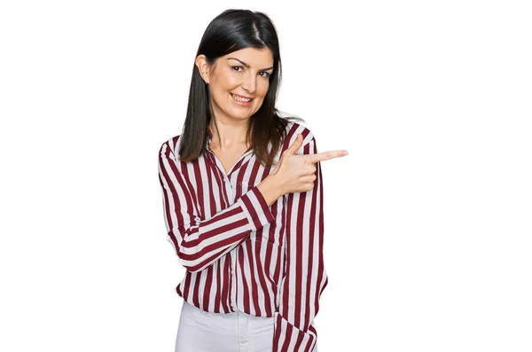 Beautiful Brunette Woman Wearing Striped Shirt Cheerful Smile Face Pointing — Stock Photo, Image