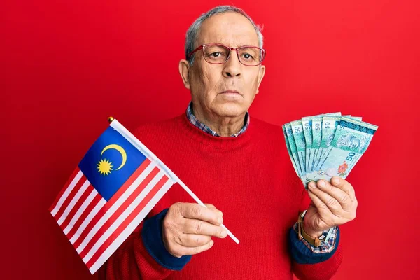 Handsome Senior Man Grey Hair Holding Malaysia Flag Malaysian Ringgit — Stock Photo, Image